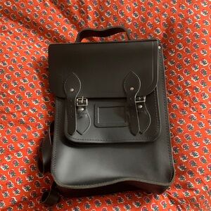 All black matte backpack, never used no scratches